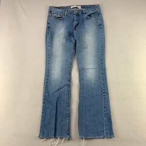 Vintage Levi's Jeans 515 Boot Cut Womens 12 Blue Denim Distressed Rodeo Y2K Work